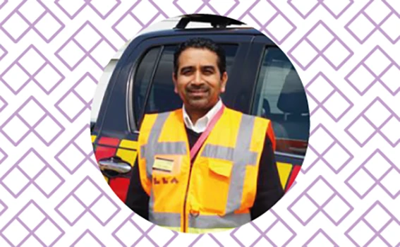Pravin Patel, Operations Duty Manager, smiling for a picture